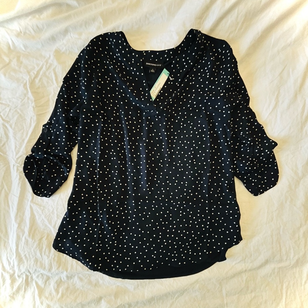 Navy and white polka dot blouse